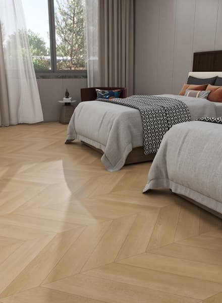 Elegant bedroom with chevron parquet flooring and curtains